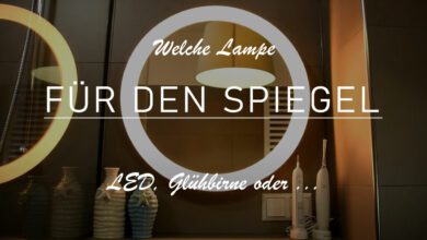 Titelbild mit der Aufschrift "Welche Lampe für den Spiegel". Zu sehen ist ein Ausschnitt aus einem Badezimmer mit einem runden Spiegel, welcher von einer runden LED-Lampe umgeben ist. Diese lässt sich auf verschiedene Lichtfarben einstellen.